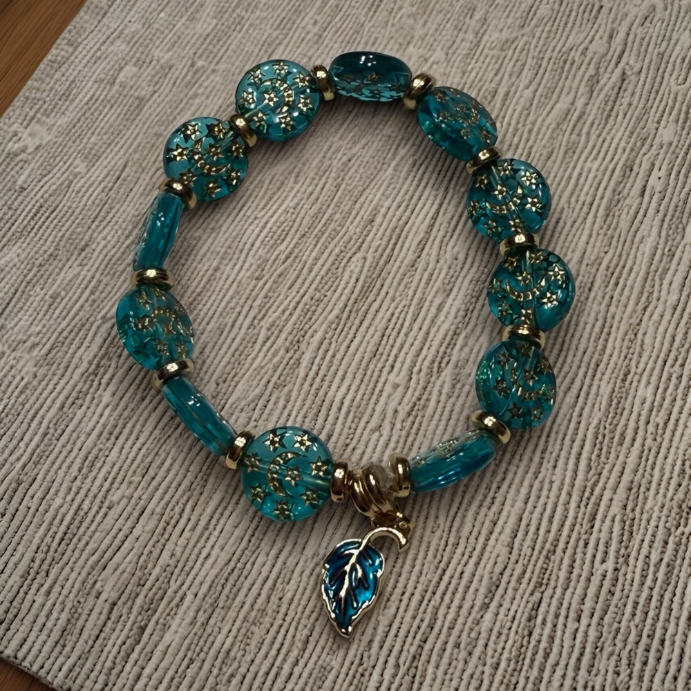 Hand Crafted Teal Acrylic Bead Bracelet with Gold Accents and Leaf Charm - Picture 3 of 5